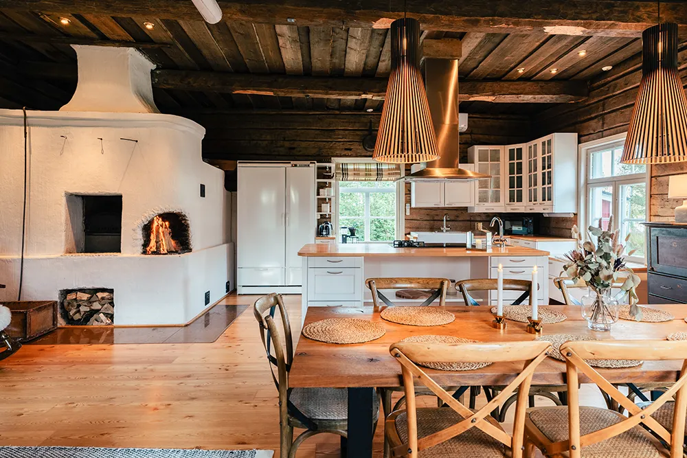 Open plan kitchen and dining area in Lapland Heritage Villa, Ranua, Lapland